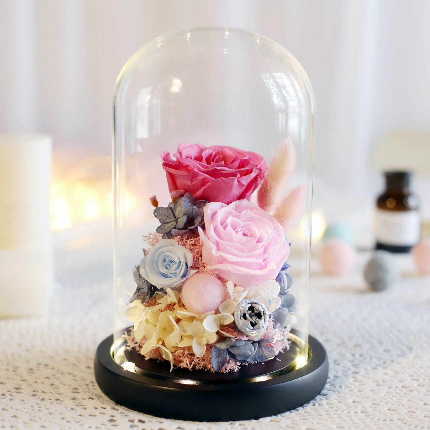 Immortal roses under glass dome.