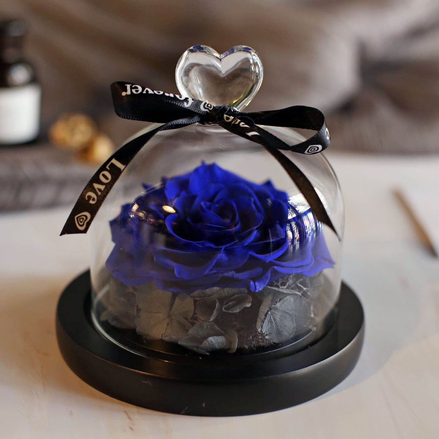 Immortal roses under glass dome.