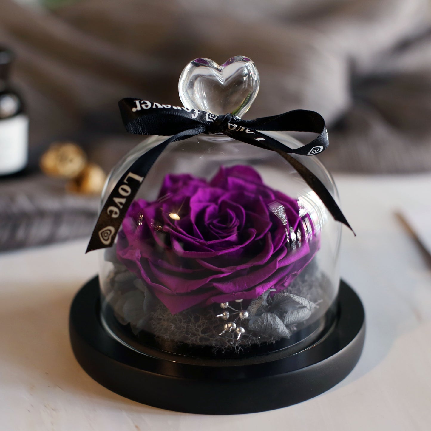 Immortal roses under glass dome.