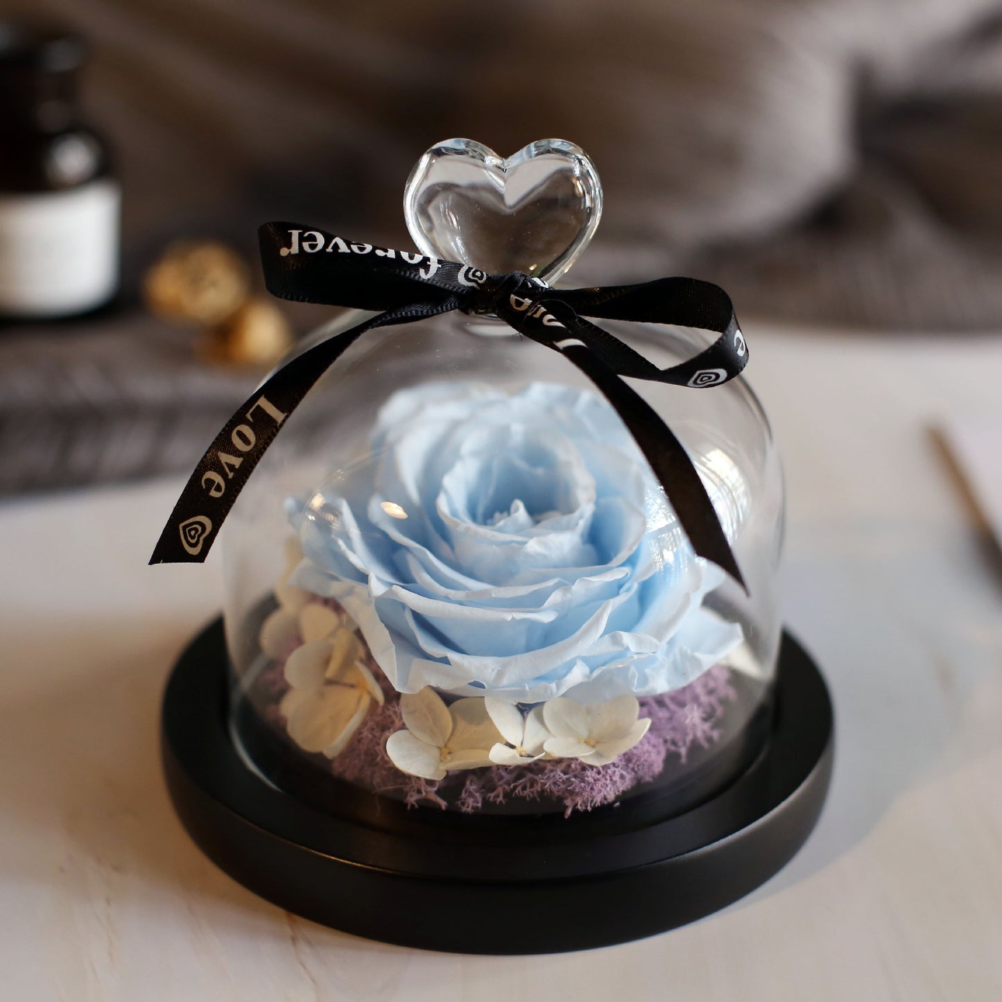 Immortal roses under glass dome.