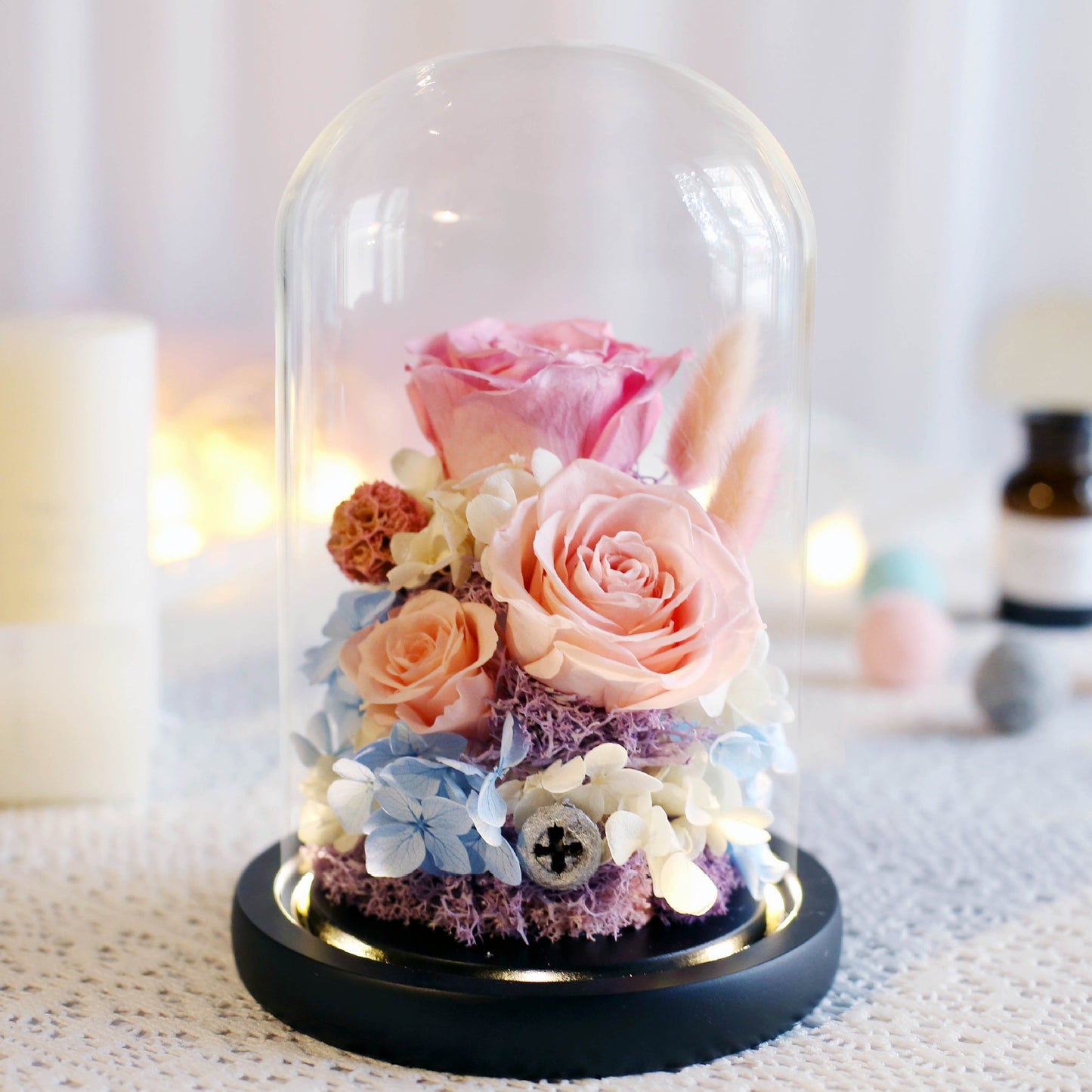Immortal roses under glass dome.