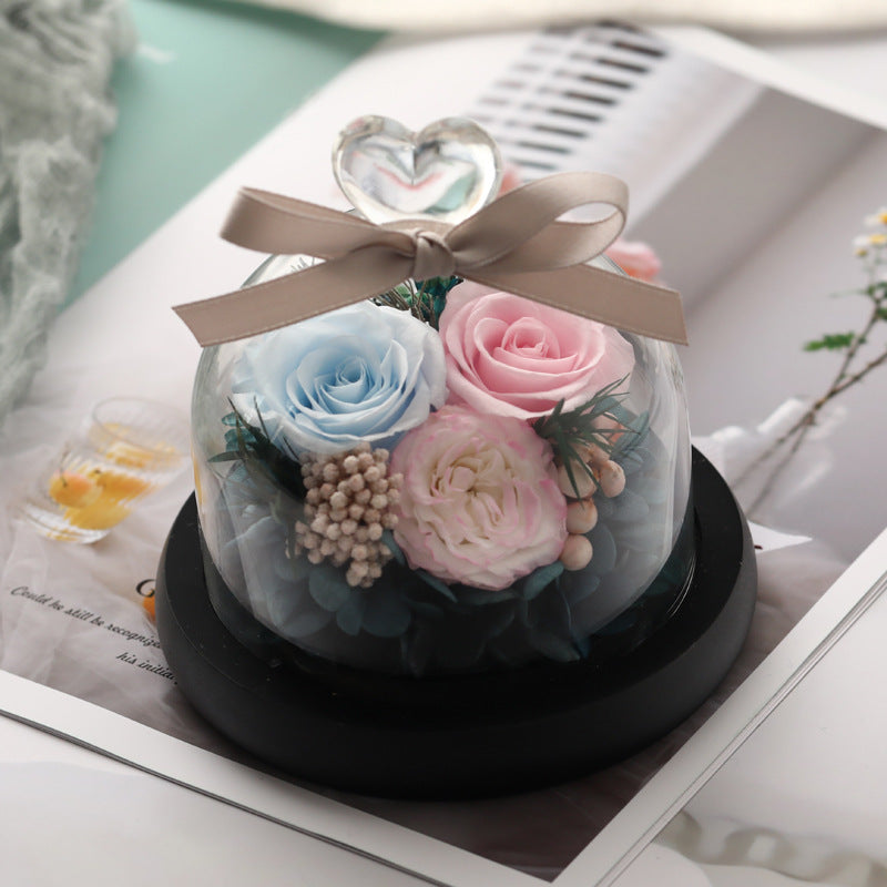 Immortal roses under glass dome.