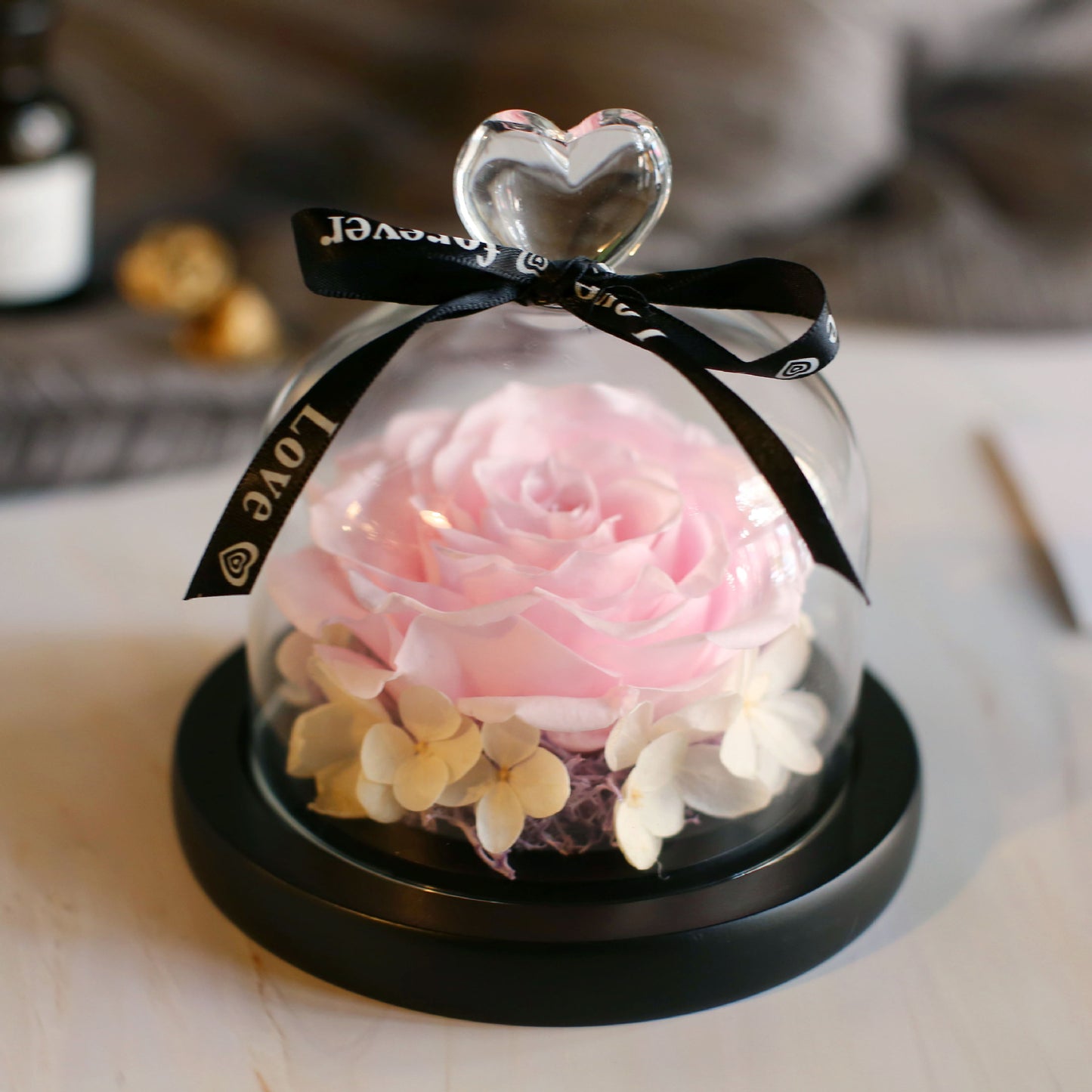 Immortal roses under glass dome.